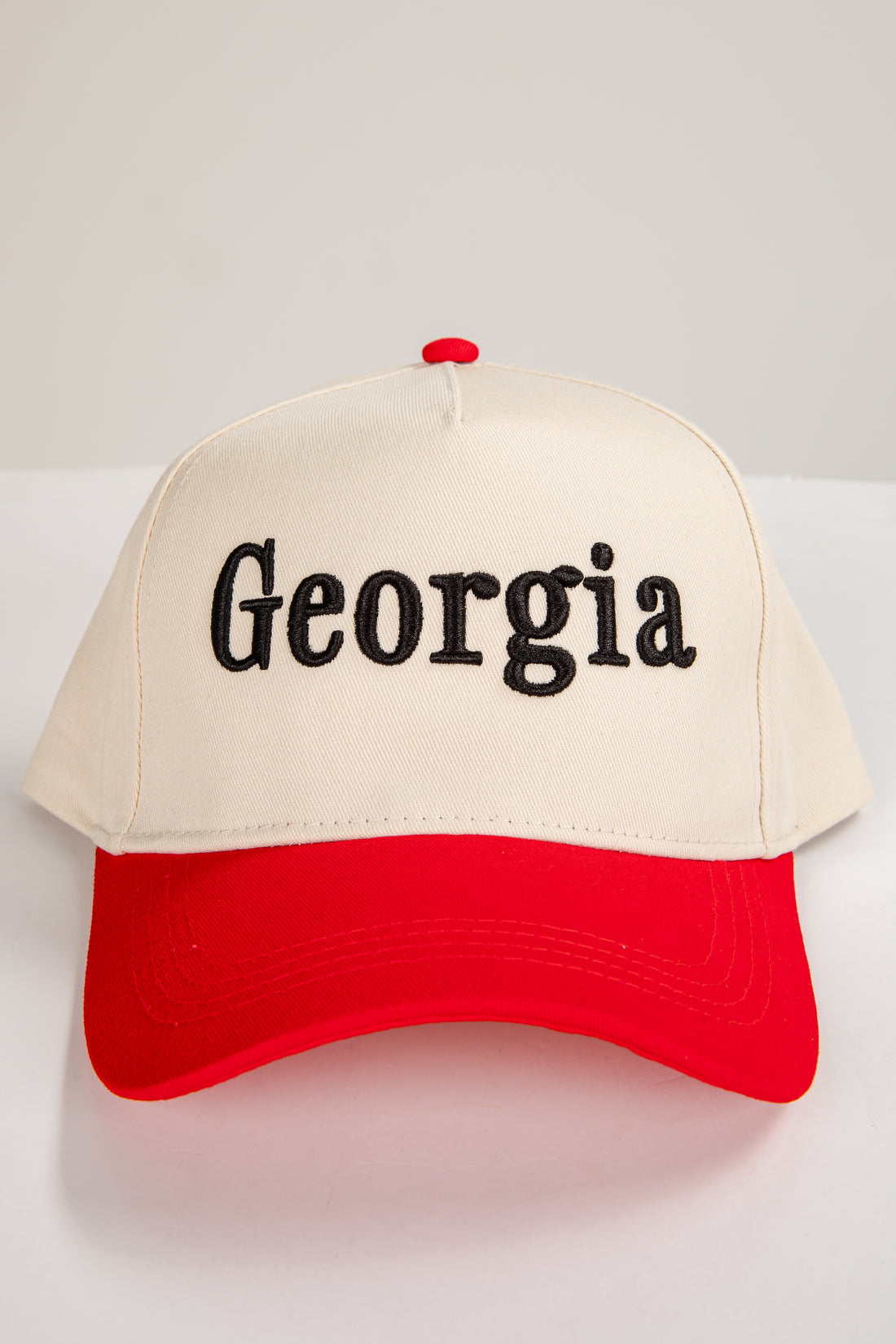 Cap with &