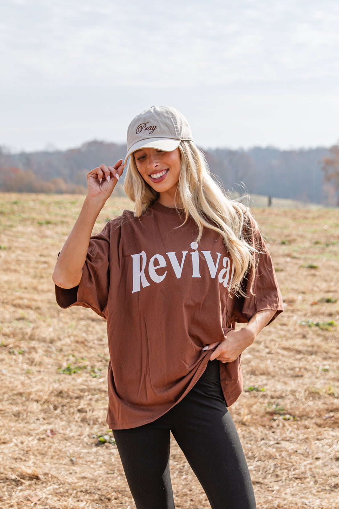 Woman wearing a brown &