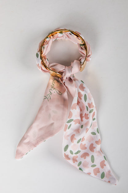 Floral patterned bracelet on a light gray background