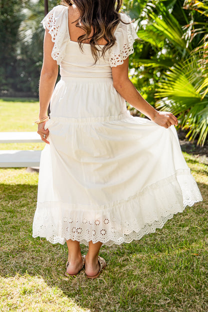 White lace-trim maxi skirt close-up